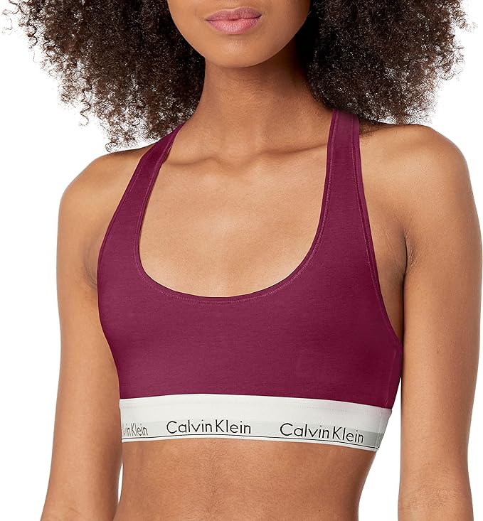 Unlined cups for a natural look and lightweight, breathable feel. Easy pullover racerback silhouette. Soft, flexible logo band retains shape wear after wear. Hardware-free. Distraction-free. For more coverage and a relaxed fit, size up.