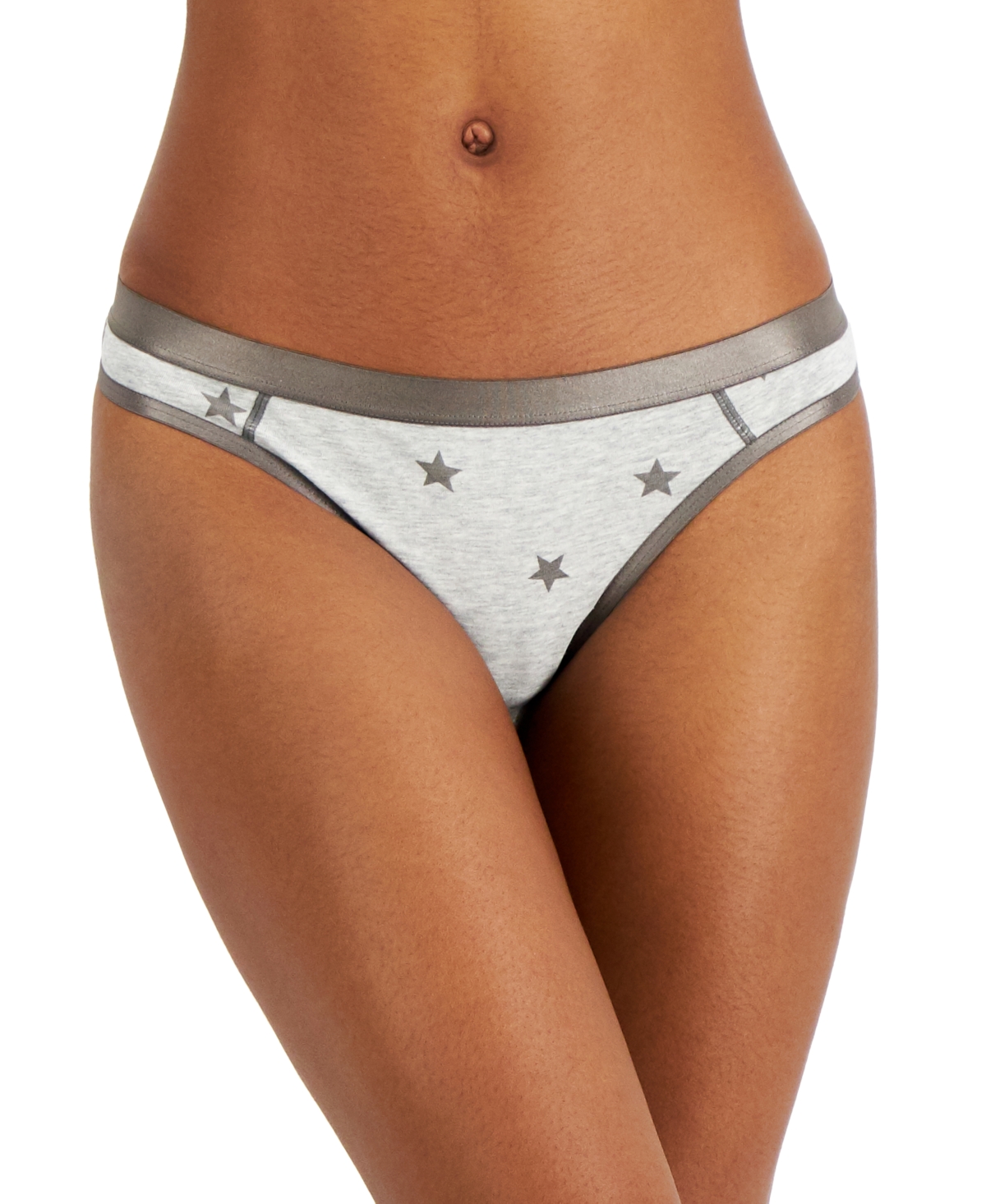 Add a touch of celestial charm to your lingerie collection with the Jenni Women's Solid Thong in a captivating Stars pattern. Crafted for comfort and style, this thong is an essential addition to any wardrobe, offering a seamless blend of functionality and feminine elegance. Features: Stars Pattern: Adorned with a stylish stars design, this thong brings a hint of sparkle and fun to your everyday essentials. Sleek Design: The solid construction provides a smooth and seamless look under clothing, ensuring no visible panty lines. Comfort Fit: Engineered for all-day comfort, the thong offers a perfect balance of stretch and support, fitting snugly without causing discomfort. Quality Fabric: Made from a premium fabric blend that is soft against the skin and provides excellent breathability, keeping you cool and comfortable. Versatile Style: Ideal for daily wear, this thong combines practicality with a touch of whimsy, making it suitable for any occasion. Material: Body: 92% Cotton, 8% Spandex Care Instructions: Machine wash cold with similar colors Use only non-chlorine bleach when needed Tumble dry low Do not iron
