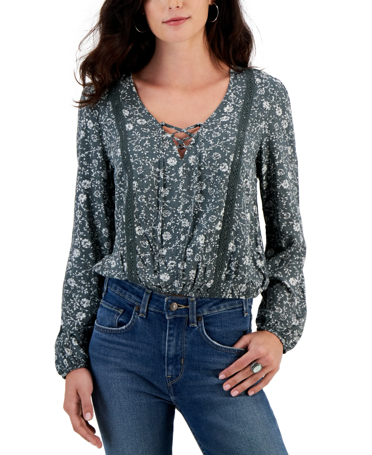 JUNIORS' LACE-UP V-NECK CROCHET-TRIMMED TOP IN THYME Touches of peasant inspiration accent the totally pretty shape of this floral lace-up crochet-trimmed top from Self Esteem. Juniors Juniors' Clothing - Tops