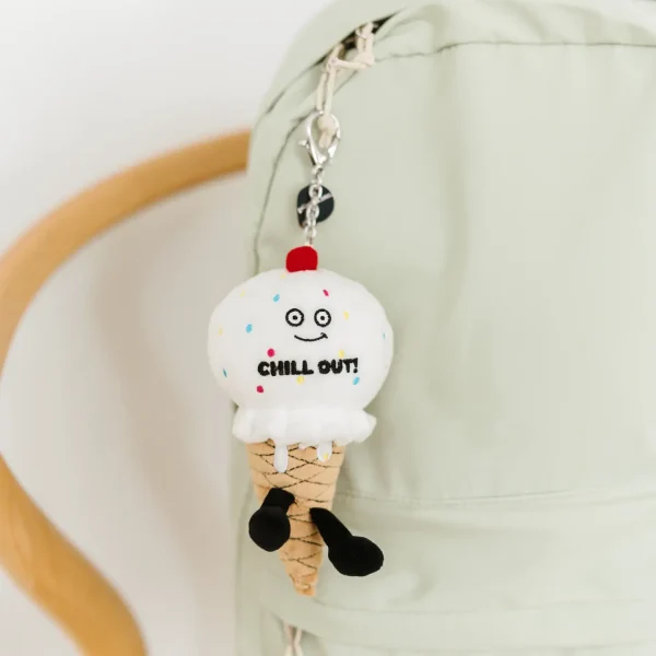 Here’s the scoop: This bag charm is too cute to ignore. Don’t get it twisted, though. He’s a cool dude who needs everyone to just chill out. With this bite-sized plush, it’s all about the toppings. His 3D cherry, colorful sprinkles, and cone body make him extra sweet. He’d make the perfect accessory for any bag, backpack, or purse.