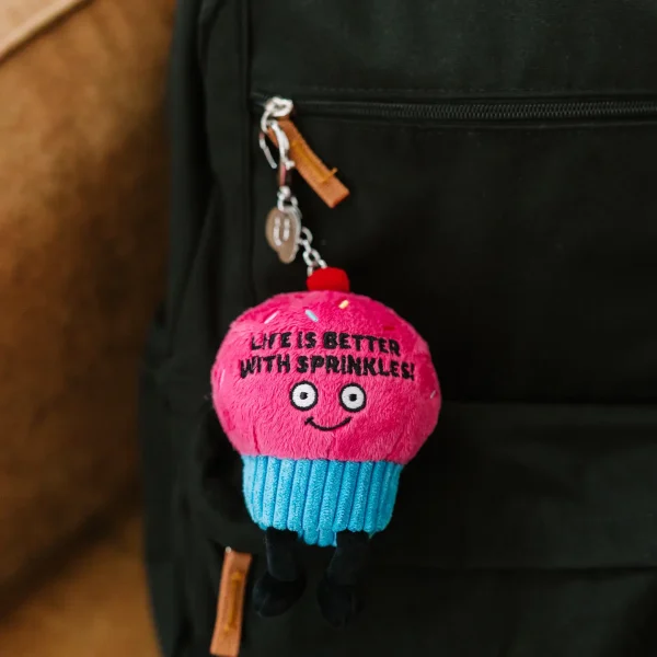 This bag charm bakes us feel all warm inside. He firmly believes that life is better with a little sugar coating. This bite-sized plush is just the cutest, and the design is only sweetened by a pair of dangly legs, 3D sprinkles, and a cherry on top. He’d be a great addition to any purse or bag.