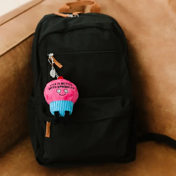 This bag charm bakes us feel all warm inside. He firmly believes that life is better with a little sugar coating. This bite-sized plush is just the cutest, and the design is only sweetened by a pair of dangly legs, 3D sprinkles, and a cherry on top. He’d be a great addition to any purse or bag.