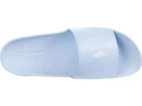 The Polo Ralph Lauren Men's Cayson Slides Elite in Blue, Size 13D, are a stylish and comfortable choice for casual wear. These slides feature a sleek design with the iconic Ralph Lauren polo logo on the strap, adding a touch of sophistication to a relaxed look. Made with durable materials, the footbed offers cushioned support for all-day comfort, while the non-slip sole ensures secure footing. Perfect for poolside lounging, beach trips, or casual outings, these slides blend luxury with practicality, making them a go-to for easy, fashionable wear.