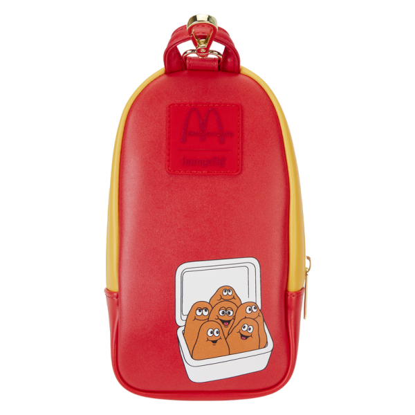 Make a dash to place an order with the Loungefly McDonald’s Chicken McNuggets Pencil Case! Inspired by one of our favorite meals, this pencil case recreates a chicken McNugget box on its front zipper pocket. Up above, a group of McNugget Buddies form a tower. Turn the pencil case around to see them make an encore appearance. A durable lobster clip appears at the top of the case, making it easy to carry your important items with you. This pencil case has plenty of space to store your essentials and makes a playful addition to your next adventure. The Loungefly McDonald’s Chicken McNuggets Pencil Case is made of vegan leather (polyurethane). Case zips closed with shiny gold hardware. Additional features include applique, debossed, and printed details. Take note of the coordinating inside lining. This pencil case is an officially licensed McDonald’s product. Pencil case dimensions: 4”W x 8”H x 2”D