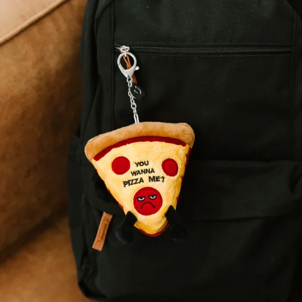 Crust me; you don’t want to mess with this plush, even if he is only bite-sized. His bothered expression is clear: You don’t want a pizza him! Yet his sauce line, 3D pepperoni pieces, and dangly legs somehow make him a-dough-able. No matter how you slice it, this pestered pepperoni pizza would make the perfect accent piece for any backpack or bag.