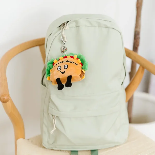 Lettuce taco ‘bout how cute this bag charm is! This bite-sized plushie is perfect for any taco lover. His fun smile, dangly legs, and 3D toppings make him simply irresistible. He’d make a spec-taco-lar addition to any backpack, purse, or wallet.