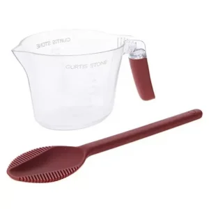 The Curtis Stone Basting Brush & Cup Set in Red is a vibrant and practical addition to any kitchen. This set features a high-quality silicone basting brush and a matching cup, both in a striking red color. The brush is designed with flexible, heat-resistant bristles that ensure even application of sauces, marinades, and glazes, while the cup is perfect for holding your basting liquids. Both items are easy to clean and durable, making them ideal for grilling, baking, and cooking. Add a splash of color and efficiency to your culinary adventures with this stylish set.