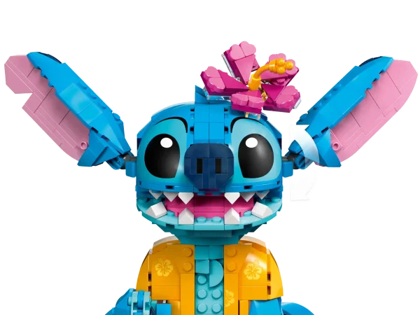 Appeal to older kids and Lilo and Stitch fans aged 9+ with this LEGO® ǀ Disney Stitch (43249) buildable play-and-display set, featuring a Stitch character. The incorrigible extraterrestrial from the hit Disney movie, dressed in a Hawaiian shirt, has movable ears and a turning head, a buildable ice-cream cone that the character can hold and a buildable flower that can be added or removed. This kids’ building kit looks great on display in any room and makes a fun Disney gift idea for older children and movie-lovers as they set up the buildable character. Kids and grown-up fans alike will appreciate the details in a building toy that lets them build and play with the iconic character together. Kids also enjoy an easy and intuitive building adventure with the LEGO Builder app, where they can zoom in and rotate models in 3D, save sets and track their progress. Disney’s Lilo and Stitch building set for kids – Buildable LEGO® ǀ Disney Stitch for girls and boys aged 9+ that sparks imagination as kids build the model, then play with and display it afterwards Disney Stitch character – This creative LEGO® building set features a displayable model from Lilo and Stitch, a buildable ice-cream cone and a flower that can be used to decorate the character Moving parts – The buildable Stitch model includes ears that can move up or down and a turning head withspace for the decorative flower, plus a hand that can hold the brick-built ice-cream cone Fun display – Create Stitch in his Hawaiian shirt, decorate him with an ice-cream cone and flower, move his head and ears into different positions to show new expressions, then set him up on display Disney gift for kids – A building toy set featuring a Disney character with functions and accessories that makes a gift for movie-lovers, girls and boys aged 9+ to share at school or home A helping hand – Let the LEGO® Builder app guide kids on an intuitive building adventure, where they can save sets, track progress and zoom in and rotate models in 3D while they build Expand life skills – With a LEGO® ǀ Disney buildable character, accessories and functions to enhance display, this kids’ construction toy helps foster life skills through fun Dimensions – This 730-piece play-and-display building set features a buildable character standing over 8 in. (20 cm) tall