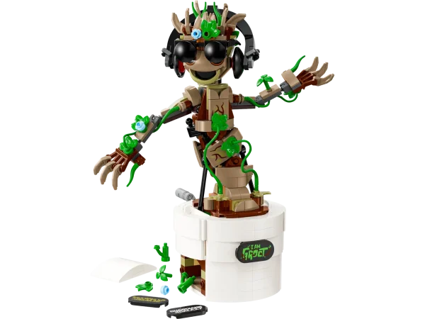 LEGO® Marvel Dancing Groot (76297) is a buildable Guardians of the Galaxy toy with an interactive dancing function. It makes a great gift for kids aged 10 and up who are fans of the Marvel character Groot, Super Heroes and buildable LEGO toys. This Groot building toy for kids has a movable head and posable arms. When kids turn the handle at the back of the flower pot, the jointed Groot starts dancing. The figure can be customized with additional leaves, buildable headphones and sunglasses, and kids can personalize Groot’s pot by adding 1 of 3 different nameplates to the front (including one related to the TV show I am Groot). All of these accessories can be stored in the pot’s built-in compartment. To make building the model even more fun, the LEGO Builder app lets kids zoom in, rotate models in 3D and track progress as they go. Buildable Groot animated toy for kids – Dancing Groot is an interactive gift for boys and girls aged 10 and up Dancing Super Hero – The playset includes a buildable Groot in a flower pot, 3 different nameplates to attach to the pot, and accessories including headphones, sunglasses and extra leaves Interactive dancing Groot – When kids turn a handle at the rear of the buildable toy, the jointed Groot model gets funky Super Hero playset – Groot’s head turns, his arms are posable, and the pot includes a built-in storage compartment for all the accessories Guardians of the Galaxy gift – Treat fans of Marvel’s Groot, Super Heroes and buildable LEGO® toys to this interactive playset 3D building instructions – Kids can download the LEGO® Builder app for an immersive building experience, with digital tools to zoom in and rotate models in 3D, save sets and track progress More LEGO® Marvel playsets – The extensive range of LEGO Marvel building toys puts an ever-changing universe of imaginative Super Hero adventures into kids’ hands 459-piece building set – The fully assembled model stands over 8.5 in. (22 cm) tall