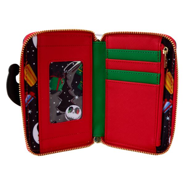 Up and down and ‘round we go! Jack and Sally take Christmas Town for a spin on this whimsical zip around wallet. A festive addition to any outing, this accessory is sure to inspire holiday spirit wherever you go. Features: Vegan leather (polyurethane) Zippered closure Shiny gold hardware 4 slots for holding cards Die-cut ID window Applique, embossed, and printed details Coordinating inside lining Dimensions: 6”W x 4”H This wallet is an officially licensed Disney product.