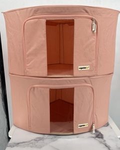 The OrganizeMe Large Corner Soft Bin in Apricot is a stylish and practical storage solution for maximizing space in any room. Designed to fit neatly into corners, this bin offers ample storage for items like clothes, toys, linens, or accessories, helping to keep your space organized and clutter-free. The soft fabric construction makes it lightweight and easy to move, while the warm apricot color adds a modern and inviting touch to your home décor. Ideal for bedrooms, living rooms, or closets, this soft bin provides both functionality and a pop of color, making organizing a breeze.