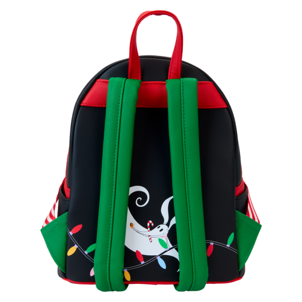 If your eyes light up at the thought of Christmas, this bag’s for you! Jack Skellington embraces the holiday spirit in a tangle of colorful lights. As daylight fades, you’ll see him glow in the dark while two of the lights illuminate with light-up details! This mini backpack makes a festive addition to any outfit and adds a bright spot to any holiday celebration. Features: Vegan leather (polyurethane) Adjustable shoulder straps with printed webbing Front zipper pocket Side drop pockets Shiny gold hardware Applique, embroidered, glow-in-the-dark, LED light, and printed details Coordinating inside lining Dimensions: 9”W x 10.5”H x 4.5”D This backpack is an officially licensed Disney product.