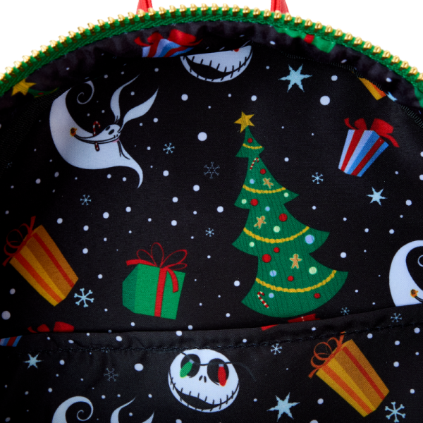 If your eyes light up at the thought of Christmas, this bag’s for you! Jack Skellington embraces the holiday spirit in a tangle of colorful lights. As daylight fades, you’ll see him glow in the dark while two of the lights illuminate with light-up details! This mini backpack makes a festive addition to any outfit and adds a bright spot to any holiday celebration. Features: Vegan leather (polyurethane) Adjustable shoulder straps with printed webbing Front zipper pocket Side drop pockets Shiny gold hardware Applique, embroidered, glow-in-the-dark, LED light, and printed details Coordinating inside lining Dimensions: 9”W x 10.5”H x 4.5”D This backpack is an officially licensed Disney product.