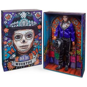 The Barbie Dia De Muertos series honors the customs, symbols and rituals often seen throughout the festive time of remembrance. Ken doll is strikingly handsome in a blue jacket with embroidered bone detail at the lapels. A sugar skull-accented hat frames his calavera face paint. May the 2023 Dia De Muertos Ken doll become a treasured holiday tradition! Includes doll stand and Certificate of Authenticity. Doll cannot stand alone. Colors and decorations may vary. For ages 6 and up. This doll is part of the Black Label Collection. This collection includes some of Barbie Signature's most sensational dolls designed for the adult collector, such as the Inspiring Women series and Day of the Dead! Black Label dolls do not have a set edition size.