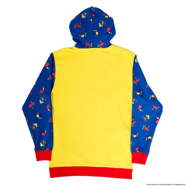 The Good Guy is ready to play up your look. Our Chucky Hooded Jersey, which resembles a Good Guys Chucky doll box, is full of frighteningly fun details. On the bright yellow middle portion, letters in red spell out “Chucky,” and the text below reads, “He wants YOU for a best friend.” It also appears that he’s ready to come out of the box, as he “slashes” a “knife” with a metallic applique blade through the clear “plastic window,” which is really a clear gel print. You’ll also see that the Chucky “box” includes pictures of the Good Guys accessories and a message to collect them all. The sleeves, similar in color to Chucky’s denim overalls, feature a motif of Good Guys accessories, such as cowboy hats, baseballs, and more. Head off to a memorable play date or other adventures in style. Features: French terry fabric: 60% cotton, 40% polyester; ribbing & cuffs: 95% cotton & 5% Spandex Side pockets Soft hand screen print, applique, and clear gel details Extra-large lanyard-style drawcord for displaying pins Lined jersey hood Comes in unisex sizes S through 3X. Sizing is very specific. This jersey is an officially licensed Universal City Studios product.