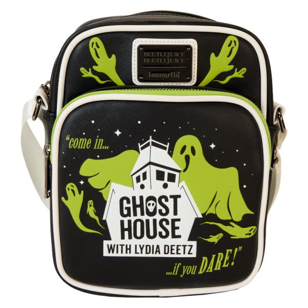 Co-ghost a show in style! Take along our Beetlejuice Beetlejuice crossbody bag featuring Lydia Deetz’s haunting television program. Frightful fun is in the details, which include appliques of eerie-looking ghosts on the front pocket and hovering above. The logo for Lydia’s show, which includes a spooky house and the words “Ghost House with Lydia Deetz,” appear below. Flip the bag around, and more ghosts materialize around the word “Ghostie.” In the dark, all lettering and images glow! Pack your daily essentials and prepare for spine-tingling adventures. Features: Vegan leather (polyurethane) Adjustable strap Zippered main compartment for securing items Zippered front pocket Gunmetal-colored hardware Applique, embossed, glow-in-the-dark, and printed details Coordinating inside lining Dimensions: 6.5”W x 8.5”H x 3”D This bag is an officially licensed Warner Bros. product.