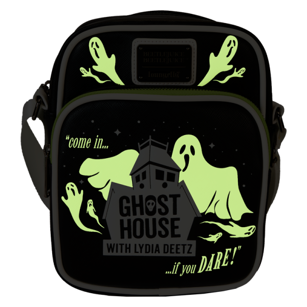 Co-ghost a show in style! Take along our Beetlejuice Beetlejuice crossbody bag featuring Lydia Deetz’s haunting television program. Frightful fun is in the details, which include appliques of eerie-looking ghosts on the front pocket and hovering above. The logo for Lydia’s show, which includes a spooky house and the words “Ghost House with Lydia Deetz,” appear below. Flip the bag around, and more ghosts materialize around the word “Ghostie.” In the dark, all lettering and images glow! Pack your daily essentials and prepare for spine-tingling adventures. Features: Vegan leather (polyurethane) Adjustable strap Zippered main compartment for securing items Zippered front pocket Gunmetal-colored hardware Applique, embossed, glow-in-the-dark, and printed details Coordinating inside lining Dimensions: 6.5”W x 8.5”H x 3”D This bag is an officially licensed Warner Bros. product.