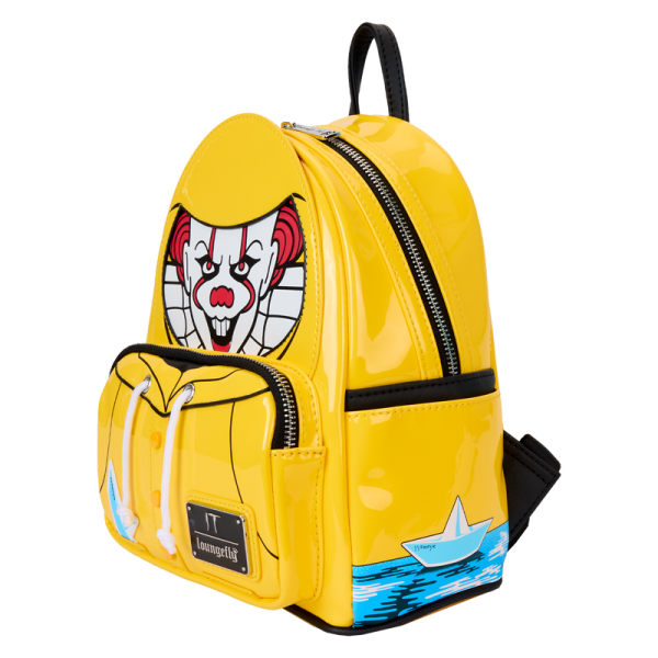 Explore creepy tunnels in style—and in wickedly fun company. Bring along this mini backpack featuring Pennywise from IT. A faux patent leather material in yellow adds a rain-slicker shine to this accessory. The front pocket has real buttons and cords for a cosplay effect. Above the front pocket, Pennywise’s face appears—and it glows in the dark. You might also be able to spot an applique of Georgie’s paper boat. Flip the backpack around, and you’ll find the words “You’ll Float Too.” Sail through your day with a monstrously stylish accessory. Features: Vegan patent leather (polyurethane) Padded, adjustable shoulder straps Side panels with printed artwork Zippered main compartment Zippered front compartment Silver-colored metal hardware Applique, printed, real button, real cord, glow-in-the-dark, and printed details Coordinating inside lining Dimensions: 9”W x 10.5”H x 4.5”D This backpack is an officially licensed Warner Bros. product.