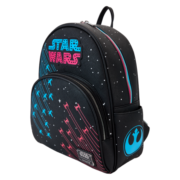 Best dressed member of the galaxy? It’s you, of course! This mini backpack channels the neon colorways of the 1970s for a look that’s out of this world. Turn down the lights to activate the bag’s glow-in-the-dark and flashing light features! This accessory makes a stellar addition to any outfit and is perfect for fans looking for a fresh take on their favorite space opera. Features: Vegan leather (polyurethane) Adjustable shoulder straps Front zipper pocket Side drop pockets Shiny silver hardware Applique, glow-in-the-dark, LED light, and printed details Coordinating inside lining Dimensions: 11.35”W x 13.75”H x 4”D This backpack is an officially licensed STAR WARS™ product.