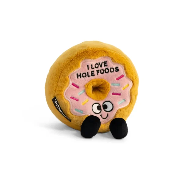 This plushie loves whole foods and thinks others should too! Donut worry though, this little guy also enjoys bagels, swiss cheese, onion rings, tortellini¦Well, you get the picture. His sweet smile, dangly legs, and 3D sprinkle details make him irresistible. He's an a-glaz-ing gift for any donut lover. This plush is ideal for children, collectors, or anyone who loves cozy and fun decor.