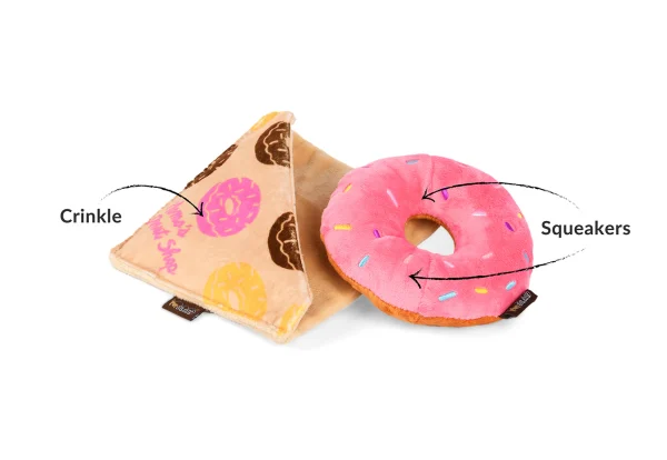 Satisfy your pup's sweet tooth with P.L.A.Y.'s Pup Cup Café Doughboy Donut toy! This pink confection features two squeakers in the doughnut's body for double the fun and a detachable crinkle sleeve for an extra layer of texture to playtime. Treat your dog to the sweetness of the perfect pastry! Hand-made craftsmanship, double layer exterior and reinforced stitching for extra durability Eco-friendly PlanetFill® filler is made from 100% post-consumer certified-safe recycled plastic bottles Machine washable and dryer friendly Features AZO-free dyes