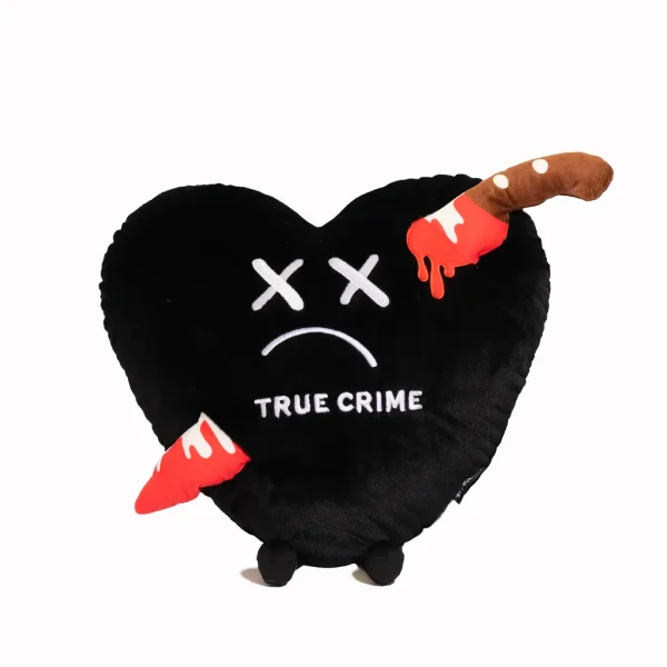 Calling all true crime, girlies! You NEED this Puffie pillow! With this oversized plushie (and like any murder mystery), the attention is all in the details. The lifeless expression and bloody knife make this item a must-have for any true crime lover. It's the perfect pillow to snuggle up with while you binge your favorite true crime podcast and try to figure out who the murderer is (even though we all know the husband did it). This plush is ideal for children, collectors, or anyone who loves cozy and fun decor.