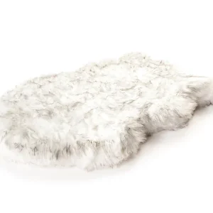 The Paw Brands PupRug Faux Fur Dog Bed in Beige (Small) is a luxurious and stylish pet bed designed to provide maximum comfort for your dog while blending seamlessly with home decor. This bed features a soft, faux fur cover that mimics the texture of real fur, creating a cozy and inviting surface for your pet to relax on. The memory foam base offers orthopedic support, helping to relieve pressure on joints, making it especially beneficial for smaller dogs or pets with arthritis or other mobility issues. The bed is both functional and fashionable, with a non-slip bottom to keep it in place. The PupRug is machine washable, ensuring easy cleaning and maintenance, while the chic beige color enhances the aesthetic of any room.