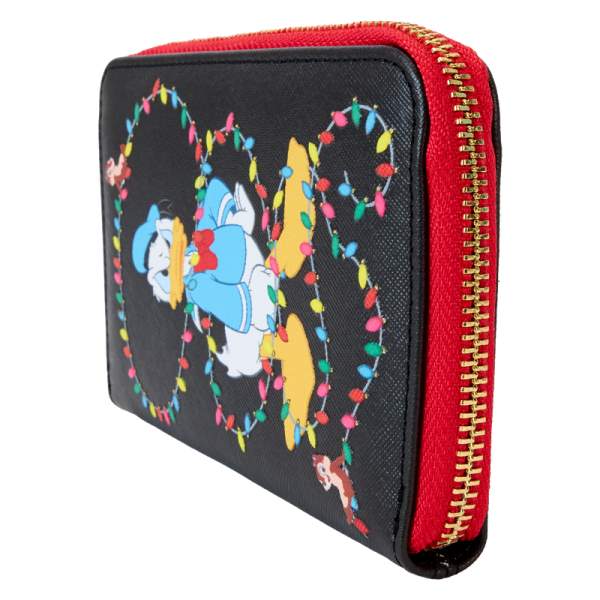 Hip-hip-hooray! Festive lights coming your way! Keep all the holiday lights close wherever you go with our Disney’s Mickey Mouse and Friends zip-around wallet. An elegant black background makes the festive lights outlining the border on the front pop. Disney’s Donald Duck is all wrapped up in a colorful strand of holiday lights that appears along the border. On the back, Disney’s Mickey Mouse and Minnie Mouse hang their own string of lights, and in the dark, the lights on both sides of the wallet glow. Spread the cheer and warmth of the season in style with this brilliant accessory. Features: Vegan leather (polyurethane) Approximately four slots for holding cards One clear ID holder with a die-cut shape of a light bulb Zipper for securing items Shiny gold-colored metal hardware Debossed, glow-in-the-dark, and printed details Coordinating inside lining Dimensions: 6”W x 4”H This wallet is an officially licensed Disney product.