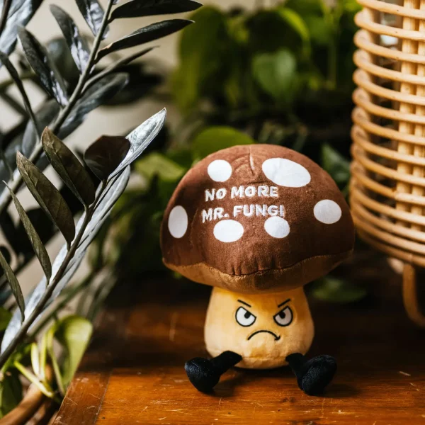 This Punchkin has had it. No more Mr. Fungi! He's done with your shiitake. He's tried to be a good spore-t, but you've pushed him too far! The cap is coming off, and he's ready to throw his morels out the window. Things are about to get wild! His angry eyes, dangly legs, and puffy top make him a mush-have plush. He's the perfect gift for any mushroom-loving friend with a good sense of humor. This plush is ideal for children, collectors, or anyone who loves cozy and fun decor.