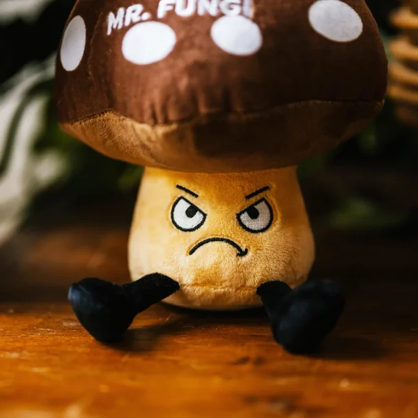 This Punchkin has had it. No more Mr. Fungi! He's done with your shiitake. He's tried to be a good spore-t, but you've pushed him too far! The cap is coming off, and he's ready to throw his morels out the window. Things are about to get wild! His angry eyes, dangly legs, and puffy top make him a mush-have plush. He's the perfect gift for any mushroom-loving friend with a good sense of humor. This plush is ideal for children, collectors, or anyone who loves cozy and fun decor.