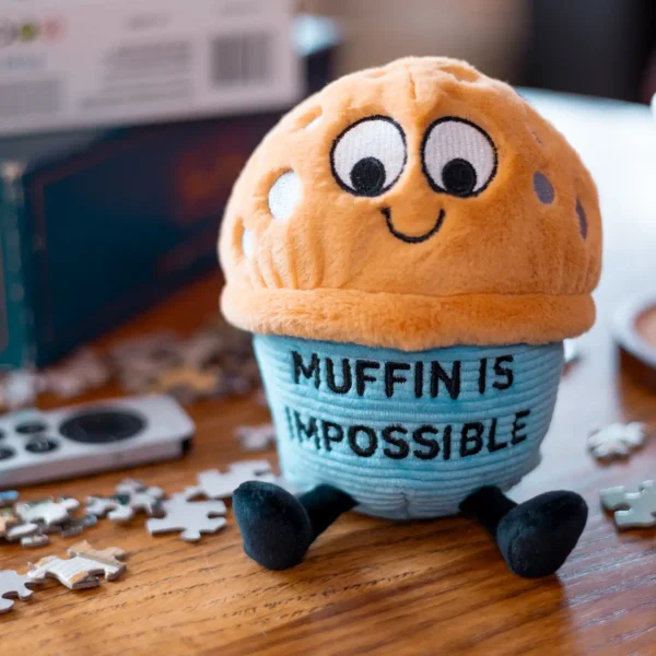 This little plushie is here to remind you that muffin is impossible! He knows that theres muffin you can't do! He wants you to bake the most of each and every day and not get wrapped up in the small stuff. His cute expression, dangly legs, and 3D toppings make him the sweetest gift. This plush is ideal for children, collectors, or anyone who loves cozy and fun decor.