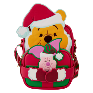 Hang the lights and pass the honey! Our Disney’s Winnie the Pooh Crossbuddies™ bag is a festively sweet way to celebrate the holidays in style. Winnie the Pooh is all decked out in a Santa hat and beard. His applique hands hug a detachable, reversible coin bag, which you can fill with a sweet treat or two. On one side, you’ll find an applique print of Disney’s Piglet, and on the other side, you’ll discover a printed applique of a beautifully wrapped honey pot gift. Piglet even makes an encore appearance as a print, inside a jar of honey. Make the season even sweeter with this fun accessory. Features: Vegan leather (polyurethane) Adjustable shoulder straps with a candy-cane striped print Detachable, reversible coin purse Gold-colored metal hardware Applique and printed details Coordinating inside lining Dimensions: 6.25”W x 8.25”H x 2.25”D