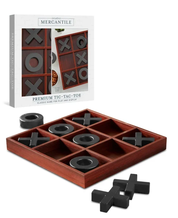 Made with top quality wood and sturdy craftsmanship, this large Studio Mercantile 14"" Tic Tac Toe board game shows off a rustic finish plus giant gold-tone painted X and O pieces that adds a striking home decor accent to the coffee table or anywhere else in the house.