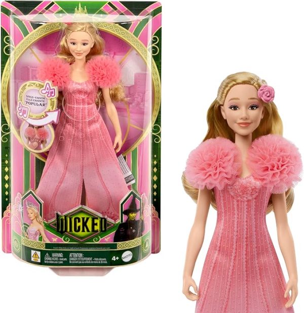 Inspired by Universal Pictures’ Wicked, the singing Glinda fashion doll brings the music to life! Sing “Popular” along with Glinda -- press the button to hear one 15-second clip, then press it again to hear a second 15-second clip. Glinda doll wears a soft, removable, pink ombre dress with puff sleeves and features her long blonde hair -- use her hair clip accessories to create even more Glinda-fied styles and looks! Highlighting the magic of sisterhood and friendship, Wicked dolls make an inspiring gift for kids to play out their biggest dreams! Fans can collect their favorite characters to recreate scenes and make up their own storylines and adventures