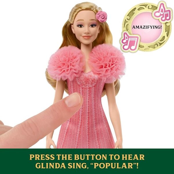 Inspired by Universal Pictures’ Wicked, the singing Glinda fashion doll brings the music to life! Sing “Popular” along with Glinda -- press the button to hear one 15-second clip, then press it again to hear a second 15-second clip. Glinda doll wears a soft, removable, pink ombre dress with puff sleeves and features her long blonde hair -- use her hair clip accessories to create even more Glinda-fied styles and looks! Highlighting the magic of sisterhood and friendship, Wicked dolls make an inspiring gift for kids to play out their biggest dreams! Fans can collect their favorite characters to recreate scenes and make up their own storylines and adventures