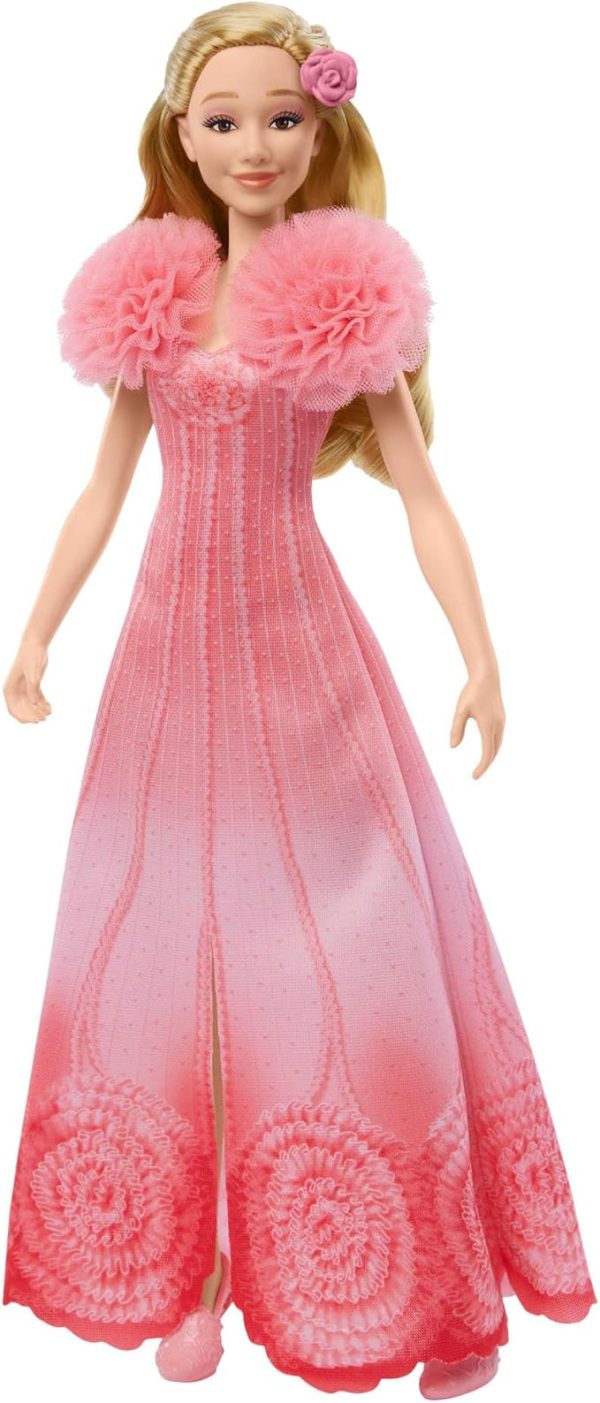 Inspired by Universal Pictures’ Wicked, the singing Glinda fashion doll brings the music to life! Sing “Popular” along with Glinda -- press the button to hear one 15-second clip, then press it again to hear a second 15-second clip. Glinda doll wears a soft, removable, pink ombre dress with puff sleeves and features her long blonde hair -- use her hair clip accessories to create even more Glinda-fied styles and looks! Highlighting the magic of sisterhood and friendship, Wicked dolls make an inspiring gift for kids to play out their biggest dreams! Fans can collect their favorite characters to recreate scenes and make up their own storylines and adventures