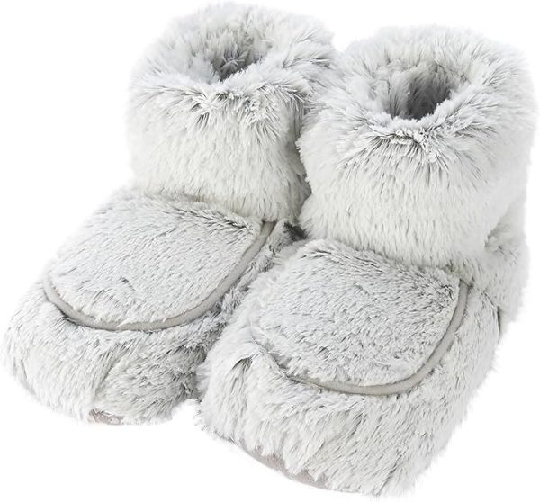 Warmies® Boots are fully microwavable and gently scented with real French lavender for the ultimate comfort and relaxation. Made with luxurious faux fur, these soft, stretchy slippers are one-size-fits-most, perfect for relieving stress and soothing tired, aching feet. Simply pop them in a microwave to provide up to an hour of soothing warmth and comfort. Quick Facts: One Size: Fits Women’s Shoe Sizes 6-10 U.S. Simply Warm in a Microwave Soothes, Warms and Comforts Scented with Real French Lavender Chill in a Freezer for Cooling Relief Safe for all Ages Non-Slip Soles Weight: 2.25lbs