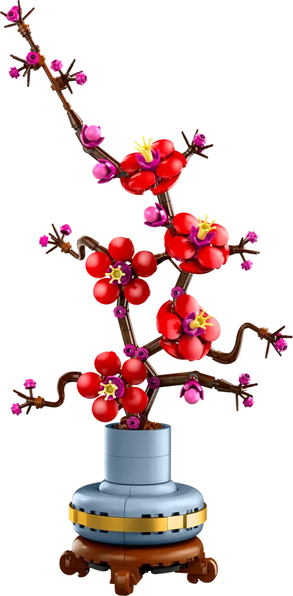 Take time out with the LEGO® Icons Plum Blossom (10369) flower decor building set for adults. The plum blossom is a popular motif in traditional art, often portrayed in ink-and-wash paintings as part of a classic quartet of beautiful plants known as the Four Gentlemen. Indulge in a mindful building project or treat a loved one to this timeless floral display – a perfect gift idea for any occasion. This detailed replica captures the elegance of the iconic winter flora with its woody stem and vivid red and magenta flowers. Set in a pastel-blue flowerpot with a golden band and wood-effect plinth, it is easy to assemble, delivers a rewarding building experience and makes a beautiful, easy-care flower display for the home and office. Discover a space for relaxation with buildable models from the LEGO Botanical Collection, part of the inspiring range of LEGO building sets designed for adults. A digital version of the building instructions is available in the LEGO Builder app. Flower decor building set for adults – Take time out or join friends and family for a relaxing building experience with the LEGO® Icons Plum Blossom flower building project Creative building for plant-lovers – This creative building set includes everything you need to craft a plum blossom flower and a pastel-blue pot with a golden band and wood-effect plinth Detailed LEGO® flower set for new and experienced builders – This LEGO interpretation of a plum blossom plant comes with an elegant woody stem and vivid red and magenta flowers Easy-care flower display for the home or office – Add a self-sufficient splash of color to any space with this buildable, zero-maintenance floral display A mindful home decor gift idea – The LEGO® Icons Plum Blossom building set makes a great birthday or any-day gift idea for adult fans of LEGO building sets and flora Includes digital building instructions – The LEGO® Builder app features a digital version of the building instructions included with this set Part of the LEGO® Botanical Collection – Discover a space for relaxation with the wide range of LEGO construction sets designed specifically for adults Dimensions –The plum blossom flower, including the plant pot and plinth in this 327-piece building set, measures over 13.5 in. (34 cm) high, 6.5 in. (17 cm) wide and 3.5 in. (9 cm) deep