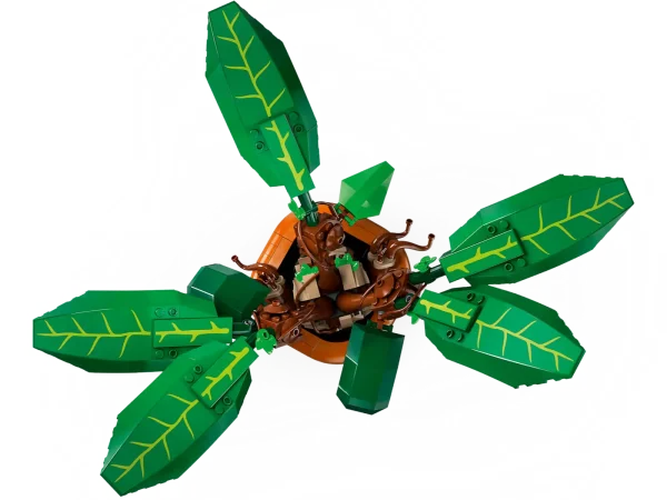 Bring the wonder of a Hogwarts™ Herbology class into kids’ lives with this LEGO® Harry Potter™ Mandrake plant toy (76433), the first-ever LEGO brick figure of the screaming plant. A magical gift and home decor idea for imaginative girls, boys and any Harry Potter fan aged 10 and up, the set features a close-to-life-size posable toy model of a Mandrake and a buildable plant pot to create a playful display. Pose the leaves of the Mandrake, remove it from the pot and move its chest up and down to animate its mouth and limbs as if it’s screaming. Add to children’s creative experience with the LEGO Builder app, where they can zoom in and rotate a 3D digital version of this model as they build, track their progress and save sets. An enchantinghome decor idea, this unusual magical creature toy is part of an extensive LEGO Harry Potter collection (sets sold separately) that offers unlimited ways to build and play out spellbinding stories. LEGO® Harry Potter™ Mandrake plant toy for playful display – The first LEGO brick-built figure of a magical Mandrake plant from the Hogwarts™ Herbology class Magical plant toy figure – Display the model of the screaming plant from the Harry Potter™ stories in its buildable plant pot or remove the Mandrake from the pot for fun nurture play Unique toy for kids with realistic details – Pose the leaves of the Mandrake, move its chest up and down to animate its mouth and limbs, and sit the creature down outside of the pot Build, play and display – This Harry Potter™ gift set offers a rewarding build-and-play experience for Harry Potter fans, and the plant pot has a nameplate to add to the display Fun LEGO® Harry Potter™ gift for kids – Give this magical creature toy as a special-occasion gift or reward to imaginative girls, boys and any Harry Potter fan aged 10 and up A helping hand – Discover intuitive instructions in the LEGO® Builder app, where builders can zoom in and rotate models in 3D, track their progress and save sets as they develop new skills Part of an extensive collection – LEGO® Harry Potter™ sets let young witches, wizards and Muggles™ play out iconic scenes, make up their own stories or simply display the models Harry Potter™ decor idea – The Mandrake toy figure in the plant pot in this 579-piece set stands over 10.5 in. (27 cm) tall