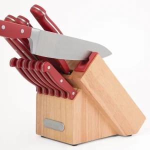 The Farberware 14-Piece Knife Set in Red is a stylish and functional addition to any kitchen. Featuring a range of essential knives, including an 8" chef’s knife, 6" utility knife, 5" santoku knife, and 3.5" paring knife, this set provides all the tools needed for chopping, slicing, and dicing with ease. Each knife is made from high-quality stainless steel for durability and sharpness. The vibrant red handles add a pop of color to your kitchen while ensuring a comfortable, non-slip grip. This set also includes a wooden block for safe storage and easy access, making it both practical and visually appealing.