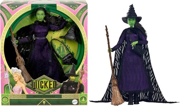 Inspired by Universal Pictures’ Wicked, this deluxe Elphaba doll captures her magical look from the musical film! With a cape draping over a sheer black dress and black boots, Elphaba can create a dramatic exit! Her iconic witch hat, broom, and satchel add the finishing touches to the signature look! With green skin and black braided hair, Elphaba doll charms with a true-to-movie look! Clip Elphaba doll onto the doll stand and create dramatic poses with 11 points of articulation! Highlighting the beauty of sisterhood and friendship, Wicked dolls make an inspiring gift for kids to play out their biggest dreams! Fans can collect their favorite characters to recreate scenes and make up their own storylines and adventures.