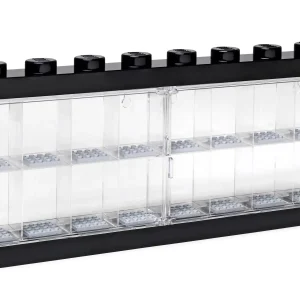 Exhibit your favorite collectible minifigures in this attractive black LEGO® Minifigure Display Case, featuring a transparent clasp door and 16 separate compartments, each with a gray baseplate to keep your minifigures perfectly posed. This sturdy case is suitable for wall mounting or display on a flat surface, and features 8 large LEGO studs for stacking multiple cases as your collection grows! Features 16 separate compartments with gray baseplates, transparent clasp door, and a black base and top with 8 large LEGO® studs for stacking multiple cases. Suitable for wall mounting or display on a flat surface. Exhibit, carry and store your favorite minifigures! Collect and stack multiple LEGO® Minifigure Display Cases for an impressive display. Measures over 7” (18cm) high, 14” (37cm) wide and 1” (4cm) deep.