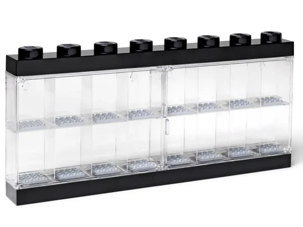 Exhibit your favorite collectible minifigures in this attractive black LEGO® Minifigure Display Case, featuring a transparent clasp door and 16 separate compartments, each with a gray baseplate to keep your minifigures perfectly posed. This sturdy case is suitable for wall mounting or display on a flat surface, and features 8 large LEGO studs for stacking multiple cases as your collection grows! Features 16 separate compartments with gray baseplates, transparent clasp door, and a black base and top with 8 large LEGO® studs for stacking multiple cases. Suitable for wall mounting or display on a flat surface. Exhibit, carry and store your favorite minifigures! Collect and stack multiple LEGO® Minifigure Display Cases for an impressive display. Measures over 7” (18cm) high, 14” (37cm) wide and 1” (4cm) deep.