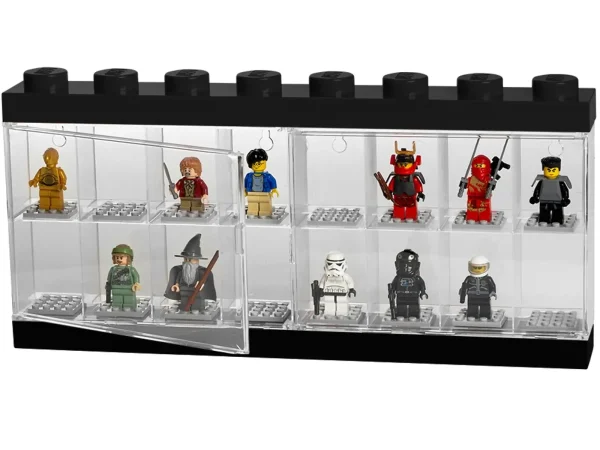 Exhibit your favorite collectible minifigures in this attractive black LEGO® Minifigure Display Case, featuring a transparent clasp door and 16 separate compartments, each with a gray baseplate to keep your minifigures perfectly posed. This sturdy case is suitable for wall mounting or display on a flat surface, and features 8 large LEGO studs for stacking multiple cases as your collection grows! Features 16 separate compartments with gray baseplates, transparent clasp door, and a black base and top with 8 large LEGO® studs for stacking multiple cases. Suitable for wall mounting or display on a flat surface. Exhibit, carry and store your favorite minifigures! Collect and stack multiple LEGO® Minifigure Display Cases for an impressive display. Measures over 7” (18cm) high, 14” (37cm) wide and 1” (4cm) deep.